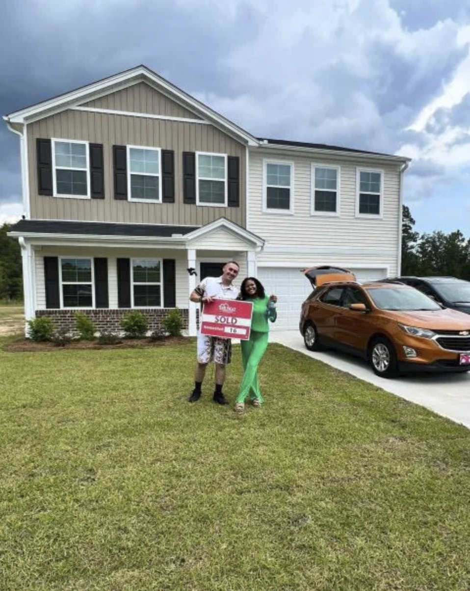 picture of Gerald B. in front of a house